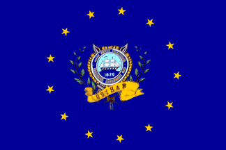 [Blue with yellow starss and coloured seal with ship and year]