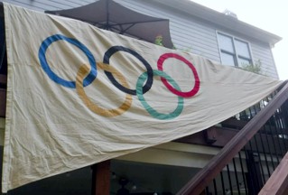 [The Olympic flag]