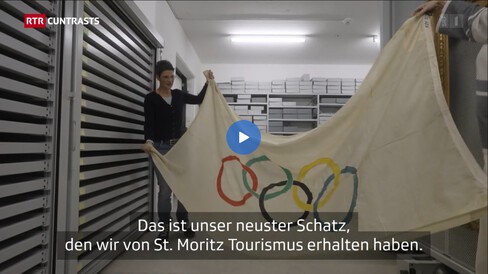 [The Olympic flag]