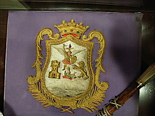 [embroidered example]