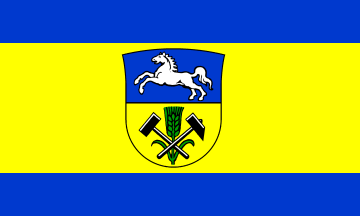 [Helmstedt County flag w/ centred CoA]